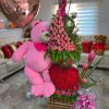 Arreglo floral de dos pisos con peluche en cali